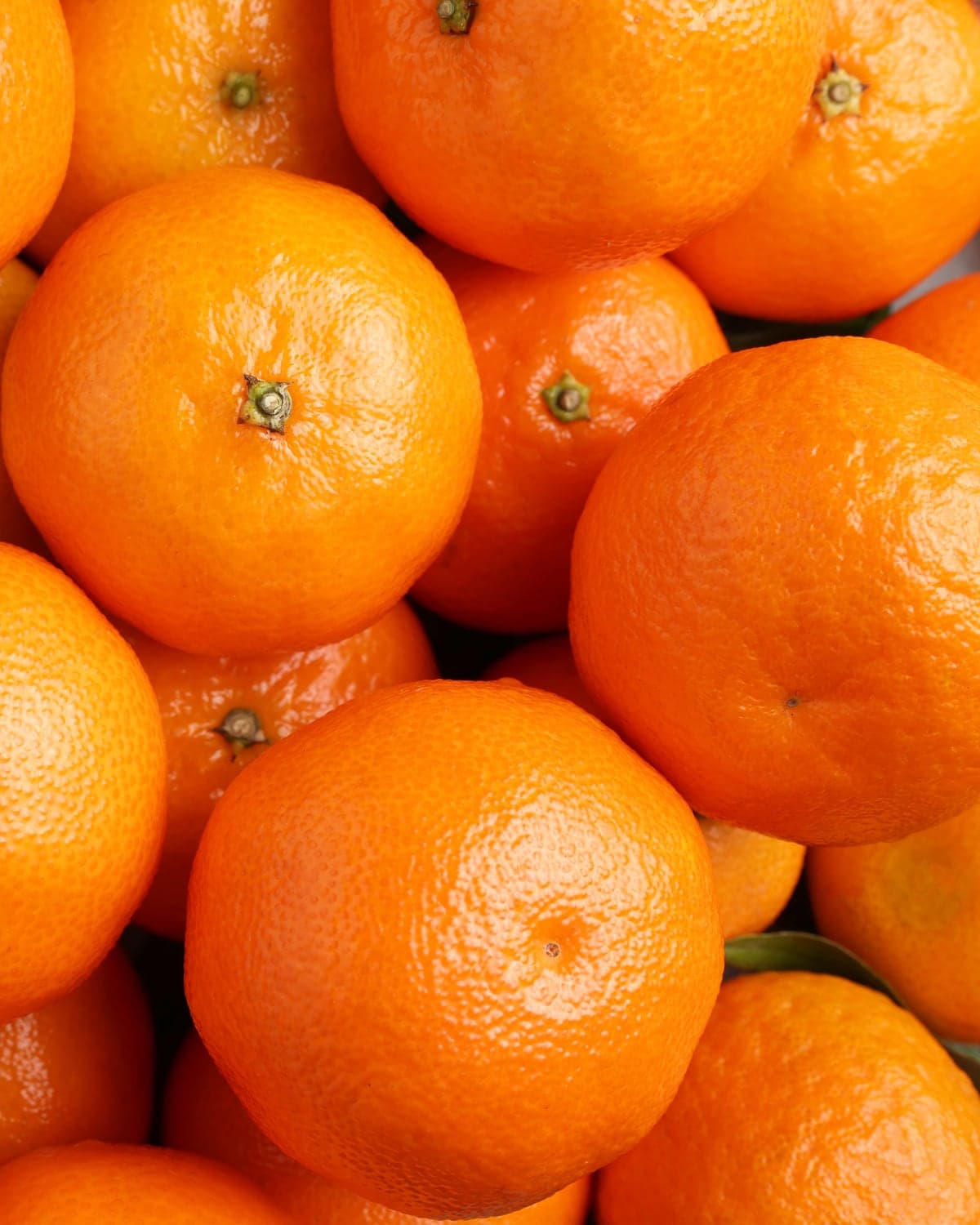 Mandarin — Seven varieties running from late September through March — easy-peel Satsumas early, Murcott late.